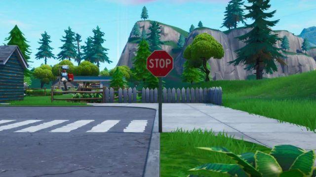Fortnite: Destroy stop signs while wearing the Click outfit, Road Trip season 10 challenge